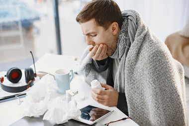 Person with common cold symptoms
